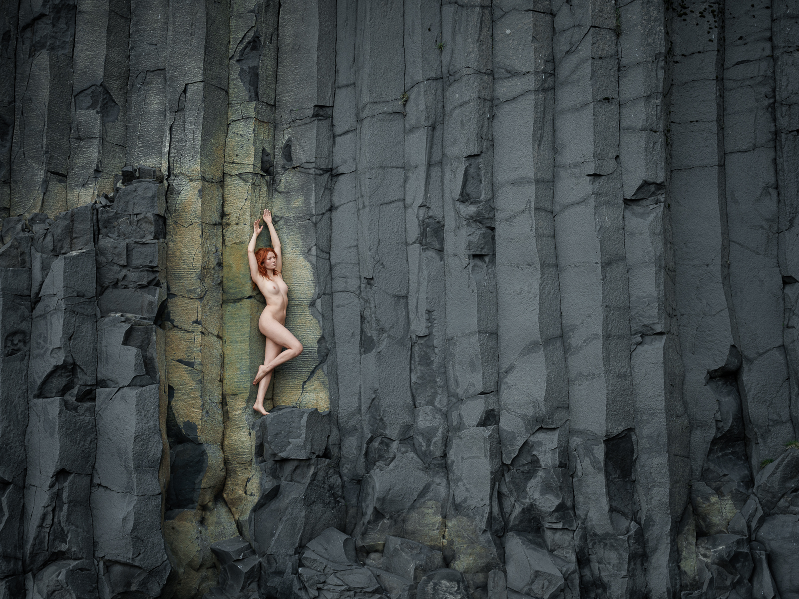 BASALT COLUMNS AND NUDE FIGURE